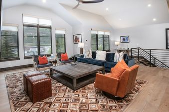 The Vail Chalet's cozy living room with modern furnishings.
