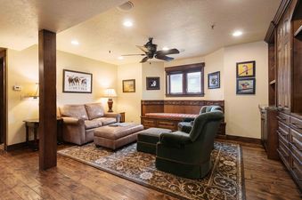 A cozy living room at Lakeside 1617 features comfortable seating and warm decor.