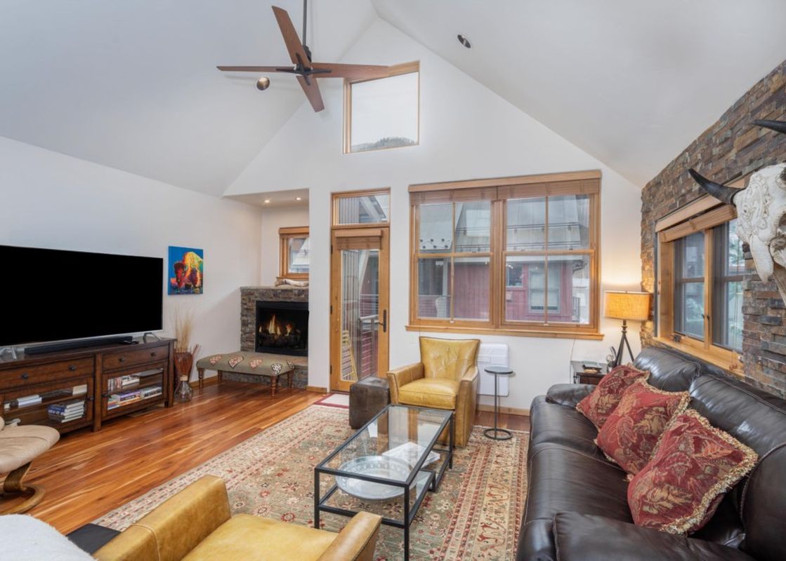 Cozy living area at Owl Meadows 16 with a fireplace and comfortable seating.