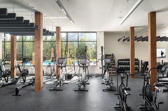 The fitness center at Moonlight Basin 215 Lakelodge is equipped with treadmills, ellipticals, stationary bikes, and rowing machines.