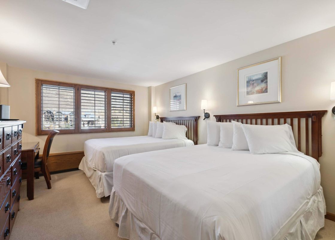 Two beds in Lodge Tower 590 QQ offer a restful retreat.