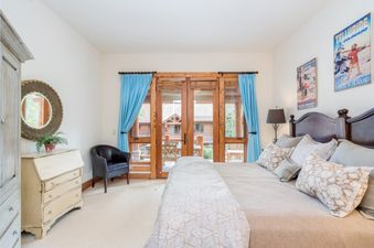 The bedroom in Villas At Tristant 221 is spacious and inviting.