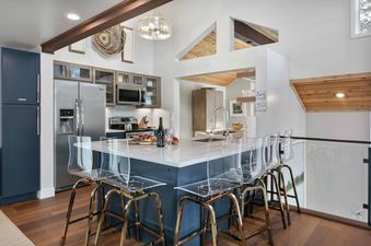 The gourmet kitchen at Ridgepoint Condos 105 features modern appliances and a spacious island.