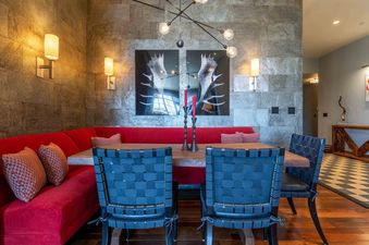 The dining area at Lost Chalet at Belvedere features modern decor.