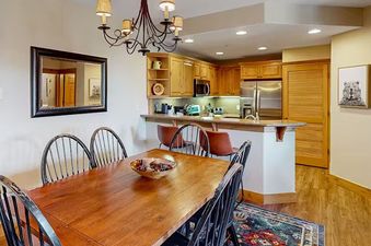 EagleRidge Lodge 203 features a unique dining space, a light-filled kitchen, and a large, comfortable living area.