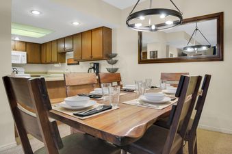 A dining table is set in the Park Station 122 dining area.