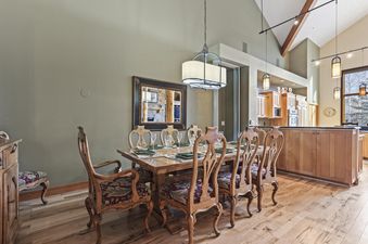 A dining table set for a meal in the Cove Retreat.