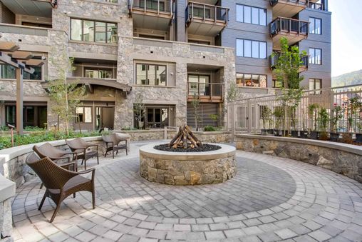 The Lion boasts a cozy fire pit area perfect for relaxing after a day on the slopes.