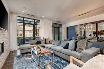 The elegant living room at Abode at Parkite 24 offers plenty of comfortable seating.