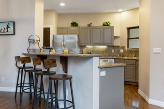 The kitchen and breakfast bar at 11A Castle Peak Close.