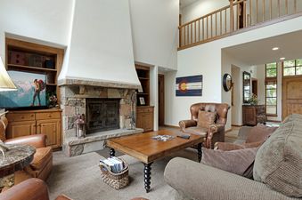 Dining area at 193 Enclave with table and chairs.