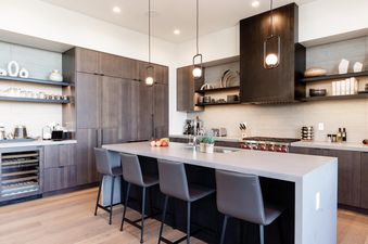 The kitchen of Moonlight Basin 6A Treeline Springs features modern appliances, a sleek design, and ample counter space.