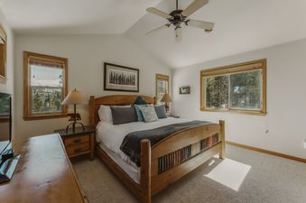 A bedroom inside of Antlers Ridge Lodge is shown.