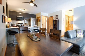 Interior of Silverado I Building B Unit 204 showcasing the dining and living area.