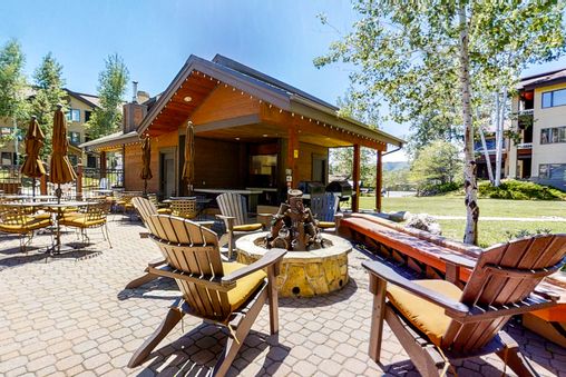 Community firepit and a gas fireplace in the living room