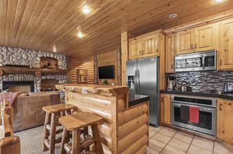 The beautiful kitchen and bar area inside Black Bear 207.