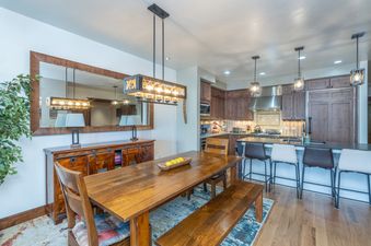 Dining table and kitchen at Trails Edge 8.