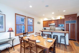 Dining and kitchen area in Pacific Street Townhome 522A.