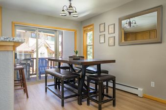 Dining table and seating in Sawmill Station 217.