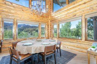 Dining area at 267 Country Club with mountain views.
