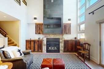 Living area in Blue Mesa 1 featuring a fireplace and modern decor.
