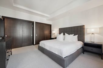 The Lion W302 features a comfortable bedroom with a king-sized bed and a large closet.