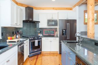 3.02-mountain-village-mountain-melody-kitchen-2-Web-scaled-1920x750 c