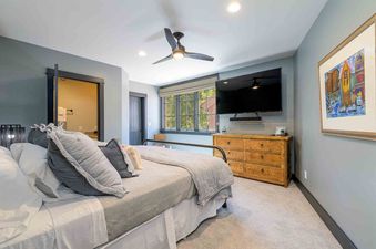The bedroom in Mountain High at the Plaza is decorated with comfort and style in mind.