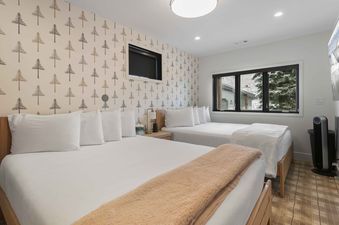 The bedroom in Boulder Creek 1072 features two comfortable beds.