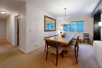 Dining table and chairs in the dining area of Teewinot C3.