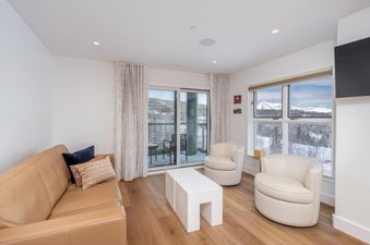 The Peaks Penthouse 334 lounge area offers comfortable seating with a view.