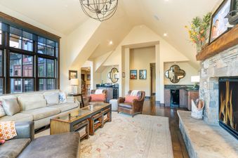 Living area in Trails Edge 5 with fireplace and comfortable seating.