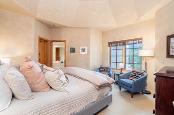 Comfort and elegance define this Westermere 411 bedroom.