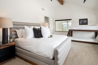 King bed in the master bedroom at Moonlight Basin 6 Silver Peaks.