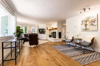 The welcoming living area at Abode at Loose Moose features comfortable seating and stylish decor.