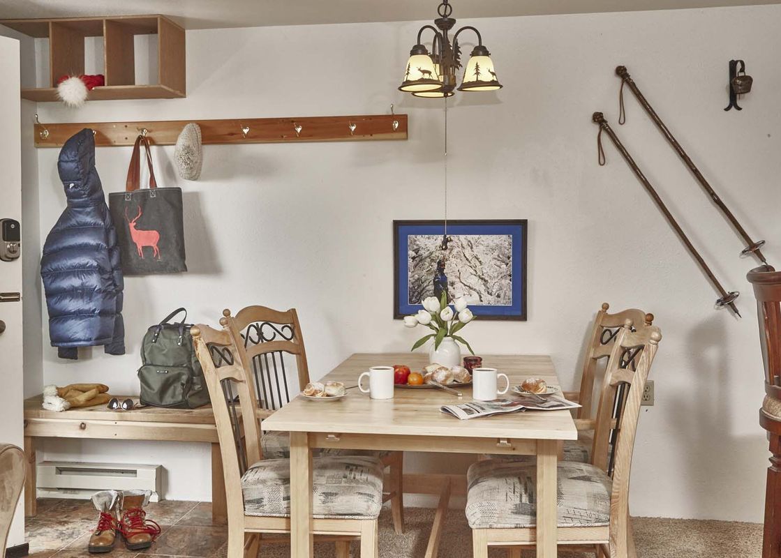 Cozy dining and entryway area in the Gros Ventre B10 villa