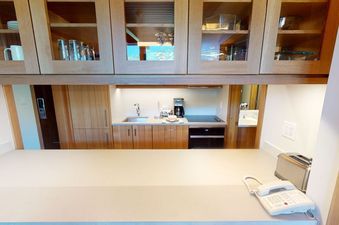 The kitchen in Manor Vail 370 is well-equipped and features a full-sized refrigerator, a microwave, a dishwasher, a stovetop, and an oven.
