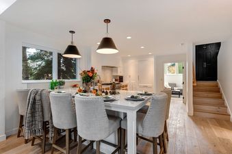 The Abode in Red Pine offers an open-concept kitchen and dining area, perfect for entertaining.