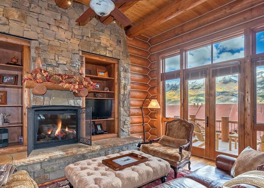 The warm and inviting living room at Townhomes On The Creek 121 is the perfect place to relax after a long day.