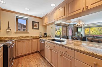 The kitchen of Lodge Tower 377 3BR is well-equipped and elegantly designed.