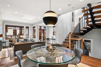 Modern open-concept dining and living space at Fitzsimmons Walk 39.