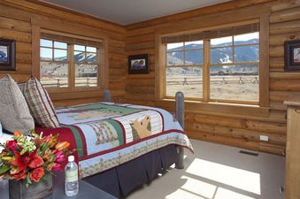 Cozy bedroom at Grand Teton Vista with mountain views.