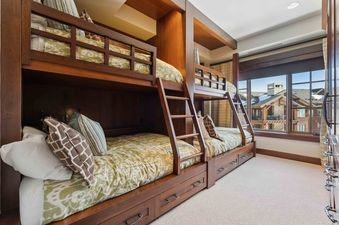 Empire Chalet at Flagstaff Lodge features a bunk bed room with four beds that are perfect for families with kids.