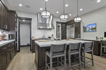 The kitchen at Silver Buck features stainless steel appliances, beautiful cabinetry and a large island.