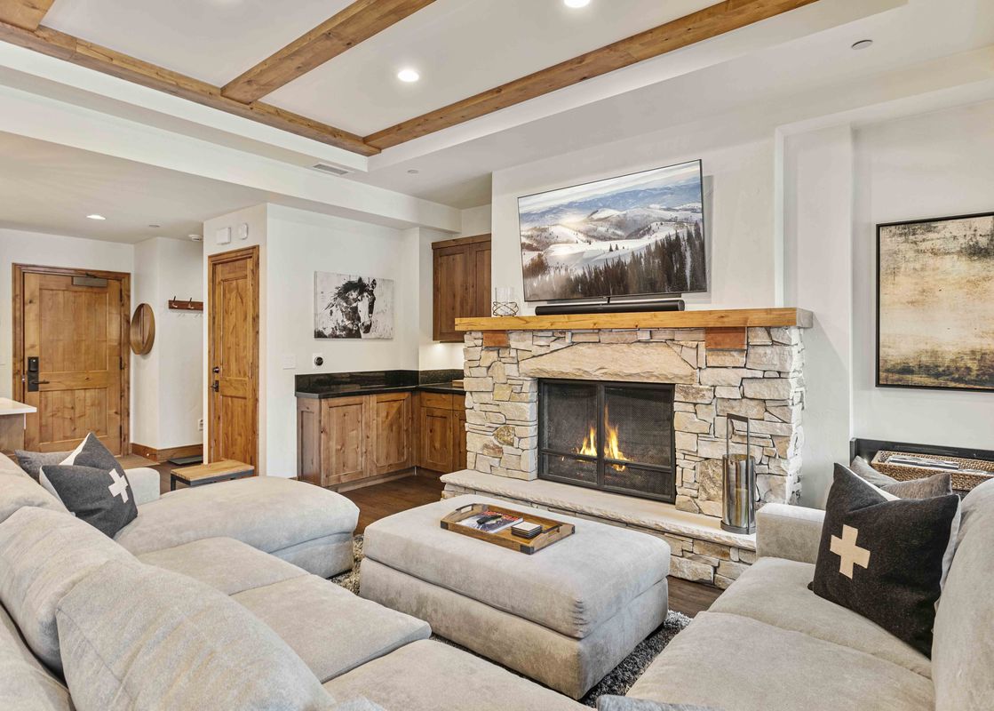 Living area in Shooting Star 304 featuring a fireplace and a large sectional sofa.