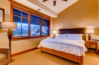 The bedroom in One Ski Hill Penthouse is a peaceful haven.