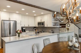 The kitchen in Montaneros 410 boasts modern appliances and a spacious countertop.