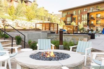 Outdoor firepit and Adirondack chairs