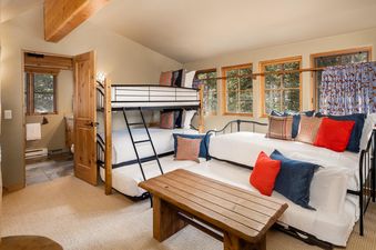 A bedroom at Moonlight Basin 6 Mountain Home Road with a bunk bed and a futon.
