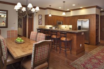 The cozy kitchen and dining space of Countryside 183.